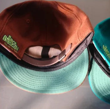 Back of Space Broccoli bucket hat, one brown.