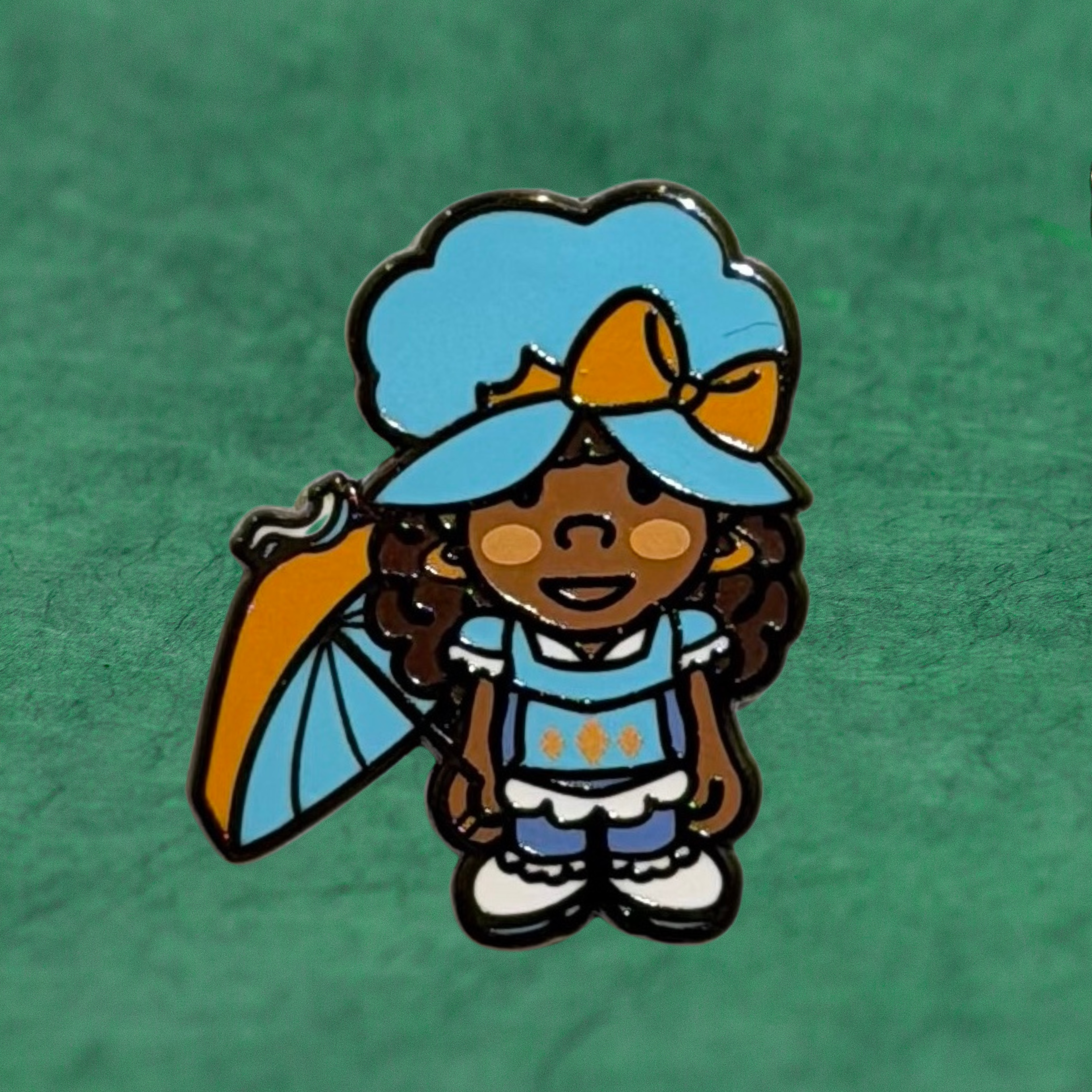 Lolli pin by Compton III, a New Orleans artist