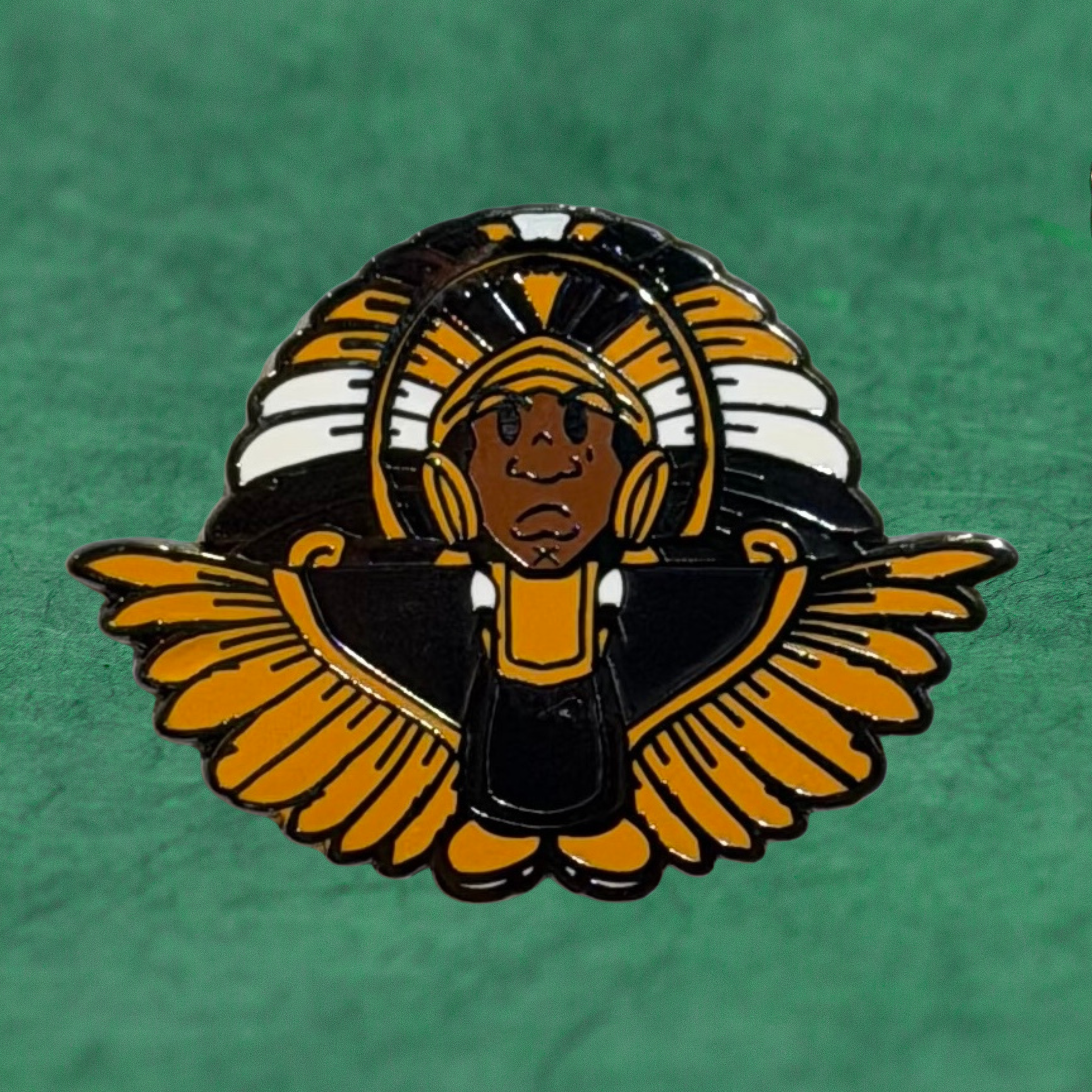 SPY BOY Saints black and gold enamel pin by Compton III, a New Orleans artist